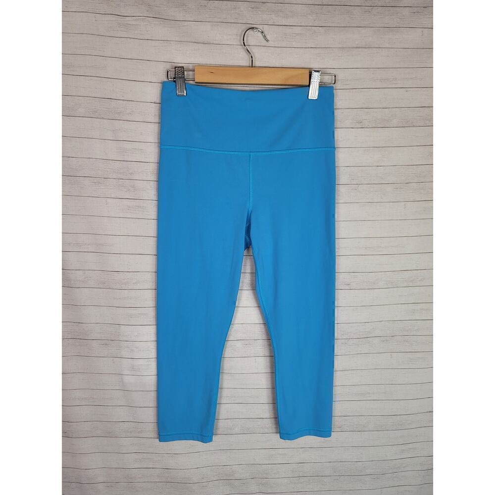 ATHLETA ULTRA HIGH RISE ELATION CAPRI IN ELECTRIC BLUE, SZ SMALL